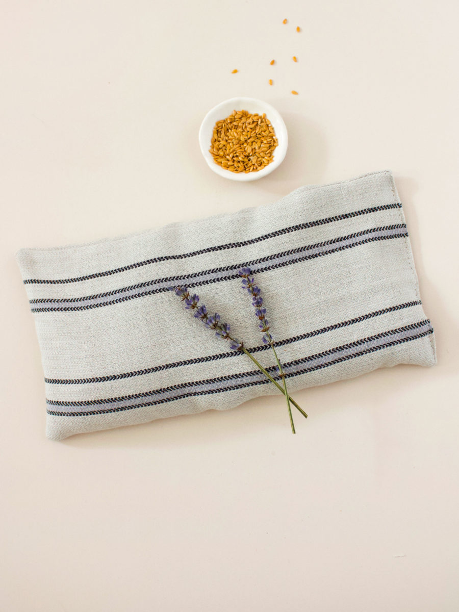 This Lavender Eye Pillow DIY is infused with essential oil and its soft cotton is filled with flaxseeds.