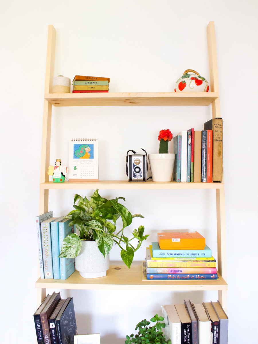 Normally leaning bookshelves or ladder shelves run between $200 - $300. This DIY leaning bookshelf cost me about $60 total...